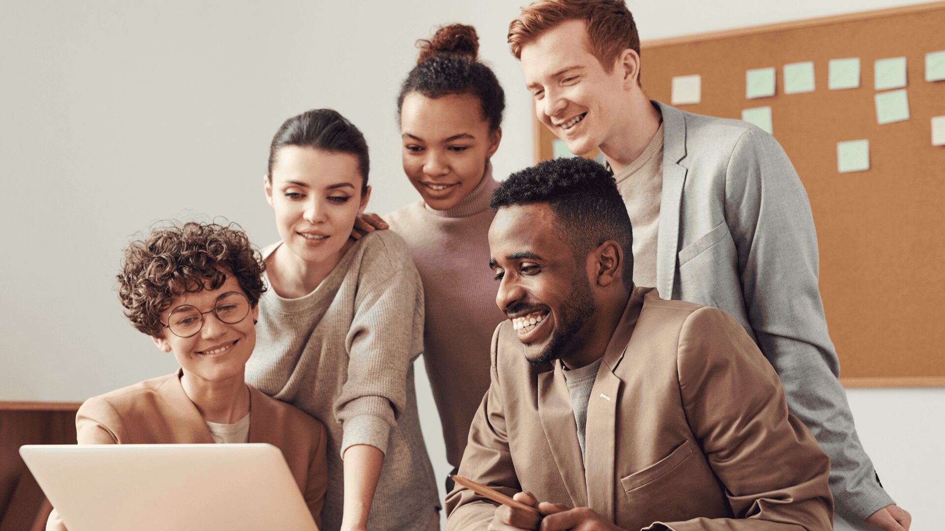 Group of young professionals collaborating on project