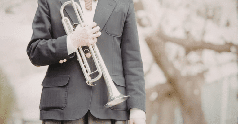 a student who is participating in an extracurricular like joining the band to help their college education